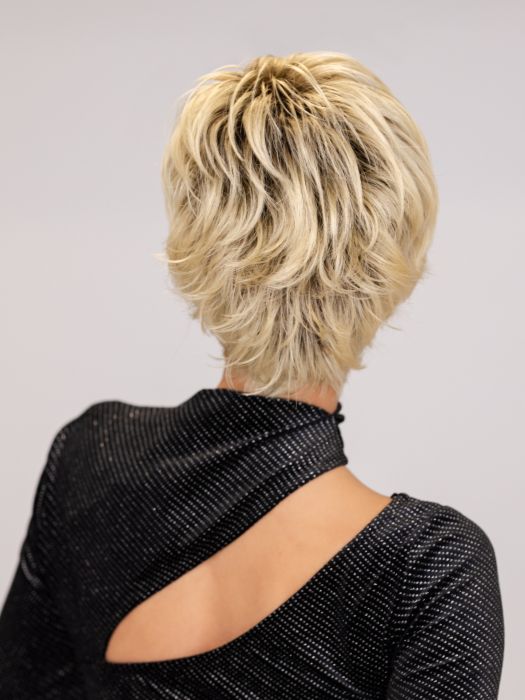 ROXIE wearing SPARKLE ELITE by RAQUEL WELCH in SS613 SHADED PLATINUM | Dark Brown Roots with Warm Platinum Blonde