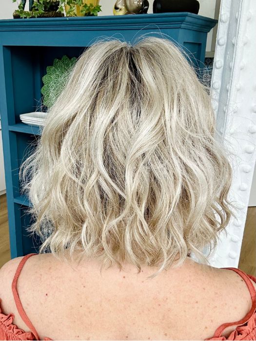 Mel B. @mels.be.ageless wearing JANUARY by JON RENAU in color FS17/101S18 PALM SPRINGS BLONDE | Light Ash Blonde with Pure White Natural Violet Bold Highlights, Shaded with Dark Natural Ash Blonde