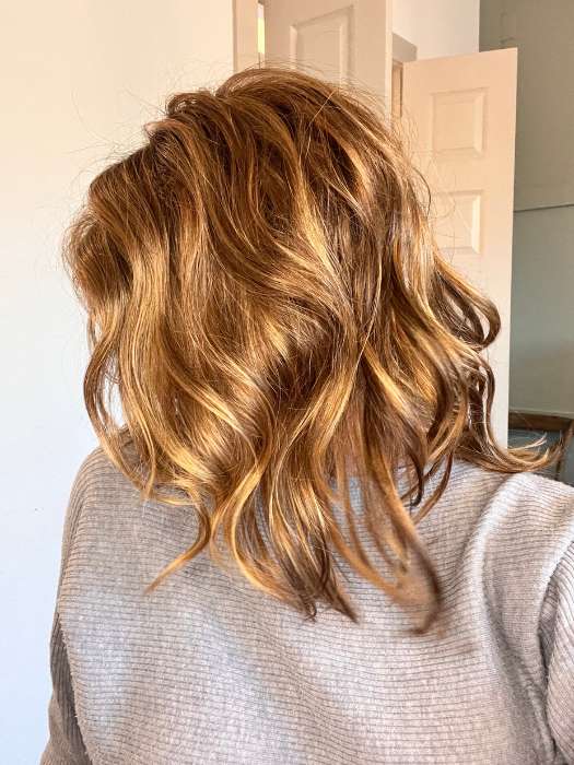 Jenny B. @thewiggygirl wearing OCEAN by ESTETICA in color R30/28/26RT4 | Medium Auburn and Light Auburn and Golden Blonde Blend with Dark Brown Roots