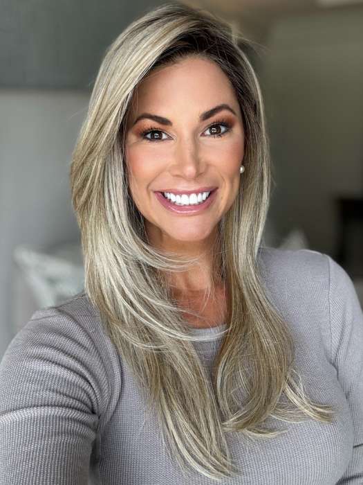 Katy C. @thewigeducator wearing MESMERIZED by RAQUEL WELCH WIGS in color RL19/23SS SHADED BISCUIT | Light Ash Blonde Evenly Blended with Cool Platinum Blonde with Dark Roots | indoor lighting