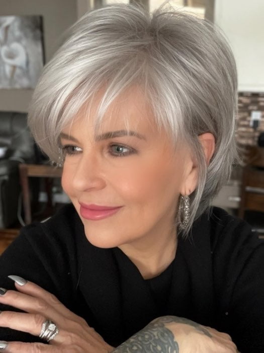 Donna @style.me.ageless wearing SKY by NORIKO in color SILVER STONE | Silver Medium Brown blend that transitions to more Silver then Medium Brown then to Silver Bangs