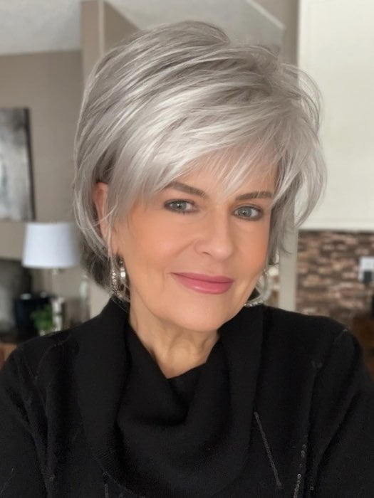 Donna @style.me.ageless wearing SKY by NORIKO in color SILVER STONE | Silver Medium Brown blend that transitions to more Silver then Medium Brown then to Silver Bangs