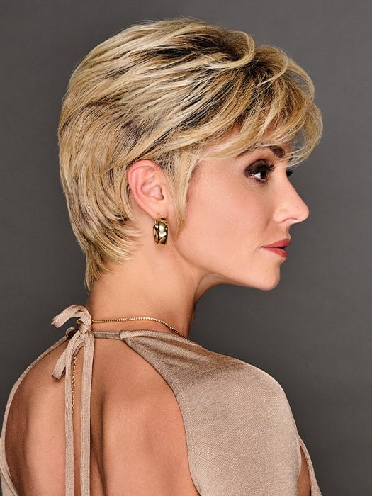 An adorable short wig with long wispy bangs