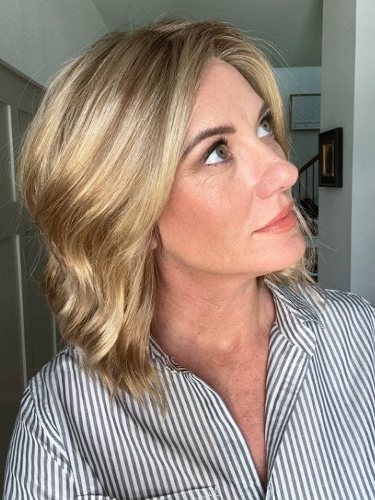 Jenny B. @thewiggygirl wearing CHARLOTTE by ENVY BY ALAN EATON in color SPARKLING CHAMPAGNE | Medium Brown roots with overall Strawberry Blonde base and soft Golden Blonde highlights