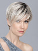 The pixie haircut features a longer fringe for a stylish hairstyle