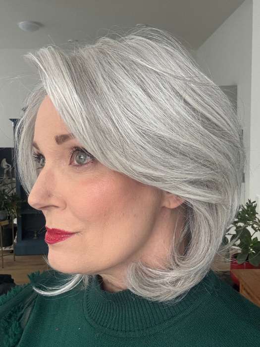 Mel B. @mels.be.ageless wearing UPSTAGE by RAQUEL WELCH WIGS in color RL56/60 SILVER MIST | Lightest Grey Evenly Blended with Pure White