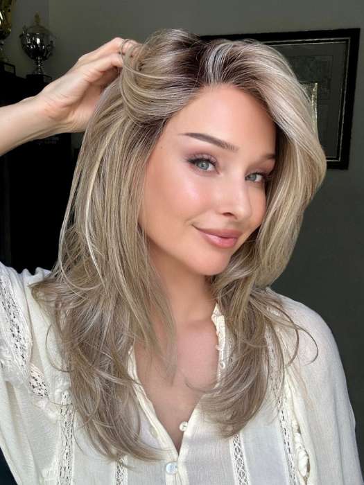 Heather @cjswigs wearing BEVERLY HILLS by BELLETRESS in color RAW SUGAR BLONDE | A Neutral Light Blonde, Honey Blonde, Pale Gold Blonde, with a base of Light Brown Low Lights featuring a Medium Root Color
