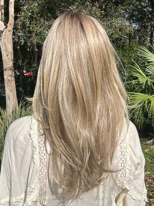 Heather @cjswigs wearing BEVERLY HILLS by BELLETRESS in color RAW SUGAR BLONDE | A Neutral Light Blonde, Honey Blonde, Pale Gold Blonde, with a base of Light Brown Low Lights featuring a Medium Root Color
