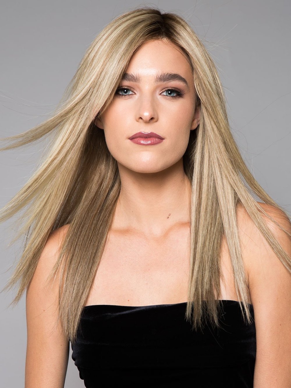 The Angie Exclusive wig is a sweeping below the shoulders, long layered style that provides the gorgeous flexibility of Remy human hair (This piece has been styled and straightened)